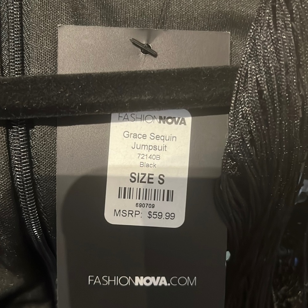 Grace Black Sequin Fringe Jumpsuit NWT peekaboo sheer down the leg. Sexy & ready